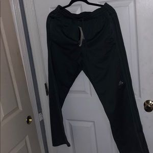 Adidas Weekender pant sizeM. Dark gray color.